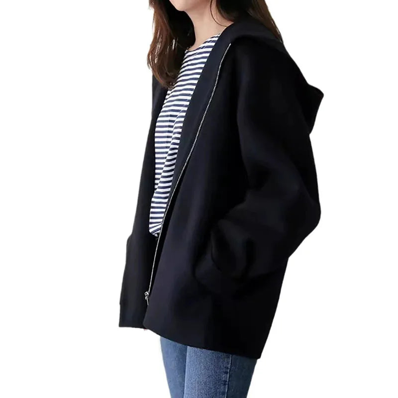 Women's hooded zip jacket with long sleeves and front pockets in beige and black