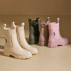 Women's Chelsea rain boots with elasticated side panels and chunky lug soles
