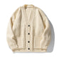 Women's oversized ribbed V-neck cardigan with buttons and patch pockets