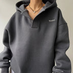 Women's oversized hoodie with attached hood and V-neck opening