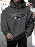Men's long-sleeve graphic hoodie with drawstring hood and kangaroo pocket