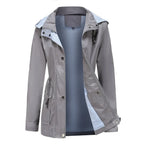 Women's hooded long-sleeved trench coat with zip front and pockets
