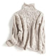 Women's textured cable knit turtleneck sweater with long sleeves