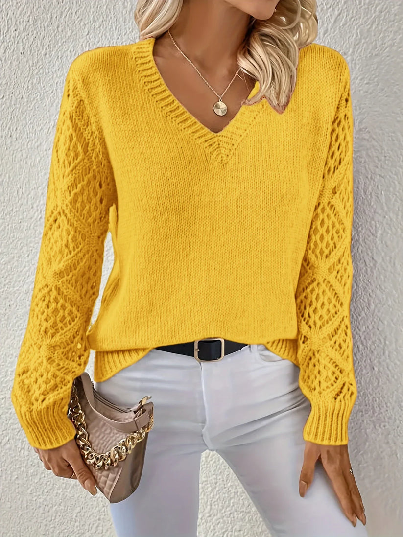 Women's V-neck knitted jumper with long openwork sleeves