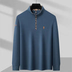 Men's quarter zip knit pullover with mock neck and checkered collar lining