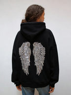 Women's hooded hoodie with large sequin wing motifs on the back