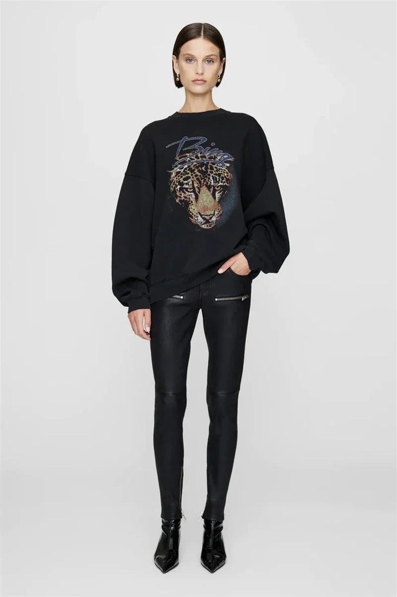 Women's crew-neck sweatshirt with long sleeves and embroidered front design