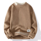 Women's textured crew neck sweater with long sleeves