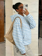 Women's oversized camouflage hoodie with hood and front kangaroo pocket