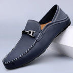 Men's slip-on loafers with moc toe stitching and metal bit detail