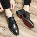 Men's cap toe Oxford shoes with lace-up front and low heel