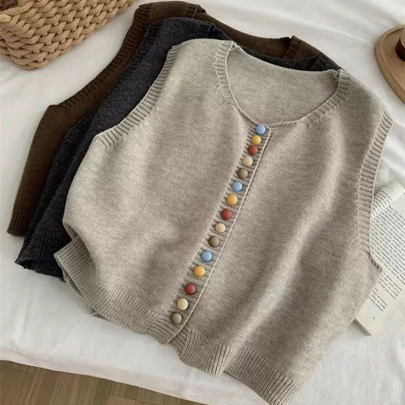 Sleeveless knit vest with scoop neck and multicolour front buttons