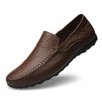 Men's slip-on leather loafers with rounded moc toe and stitched detailing