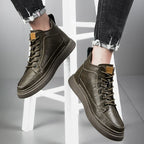 Men's lace-up ankle boots with stitched panels and platform sole