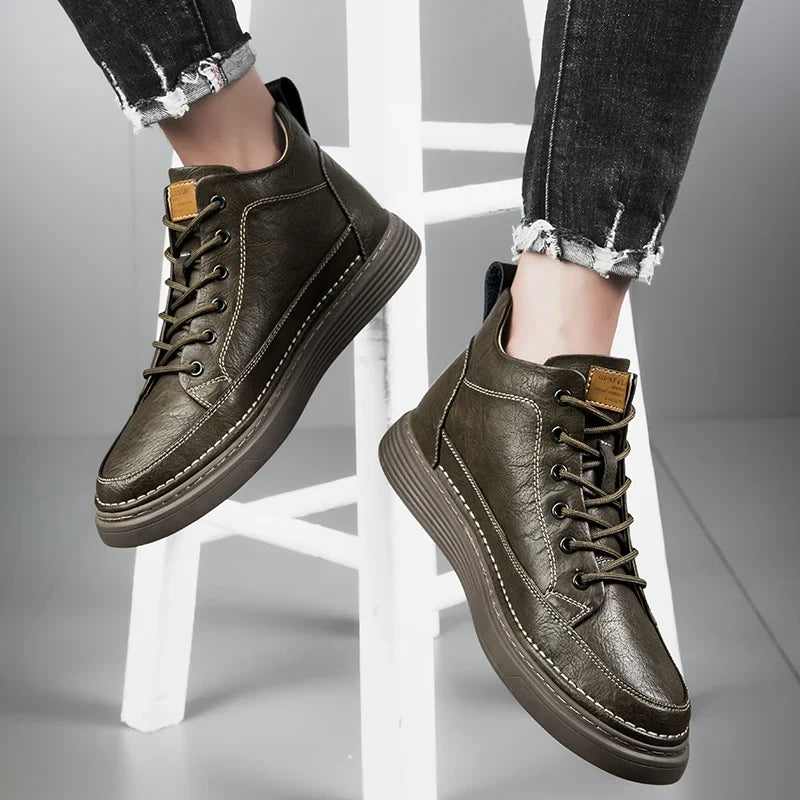 Men's lace-up ankle boots with stitched panels and platform sole