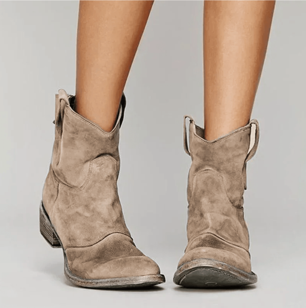 Women's suede ankle boots with low block heels and side pull tabs