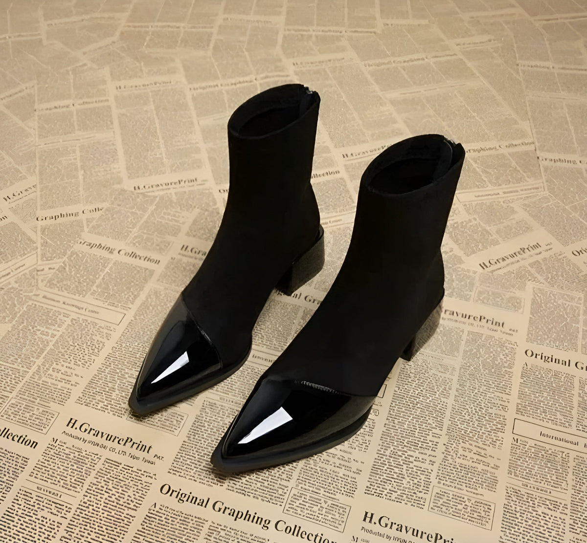 Women's pointed-toe ankle boots with glossy trim and block heels