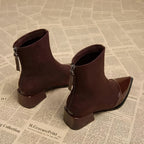 Women's pointed-toe ankle boots with glossy trim and block heels