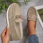 Women's slip-on loafers with moccasin stitching and decorative buckle detail