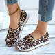 Women's leopard print loafers with gold-tone penny strap detail