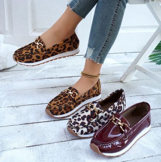 Women's leopard print loafers with gold-tone penny strap detail