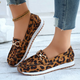 Women's leopard print loafers with gold-tone penny strap detail