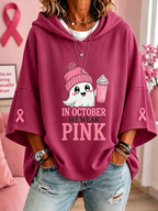 Women's hooded top with short sleeves, ghost graphic and pink ribbon sleeve details