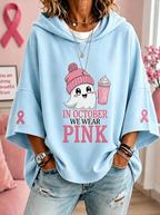 Women's hooded top with short sleeves, ghost graphic and pink ribbon sleeve details