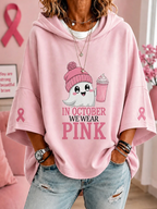 Women's hooded top with short sleeves, ghost graphic and pink ribbon sleeve details