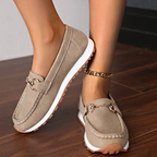 Women's flat loafers with moc toe stitching and metal buckle detail
