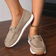 Women's flat loafers with moc toe stitching and metal buckle detail
