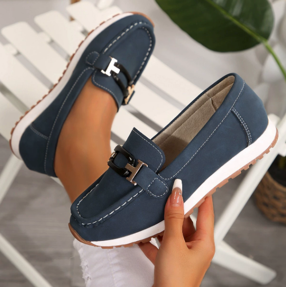 Women's navy chain detail loafers with moc toe and flat sole