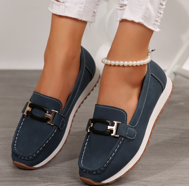 Women's navy chain detail loafers with moc toe and flat sole