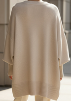 Oversized knit sweater with crew neckline and long sleeves