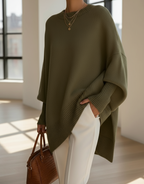Oversized knit sweater with crew neckline and long sleeves