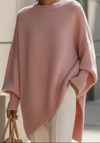 Oversized knit sweater with crew neckline and long sleeves
