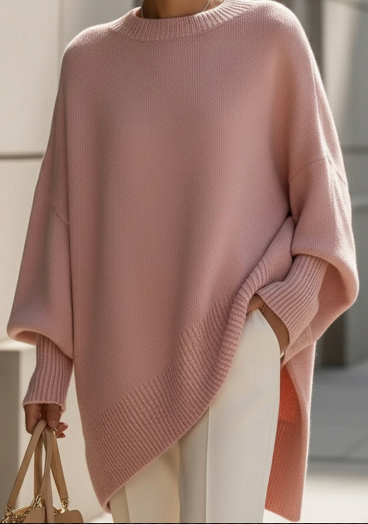 Oversized knit sweater with crew neckline and long sleeves