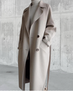 Women's long trench coat with lapels, belt and double-breasted buttons