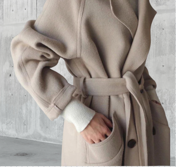 Women's long trench coat with lapels, belt and double-breasted buttons
