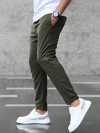 Men's tapered trousers with drawstring waist, side pockets and cuffed ankles
