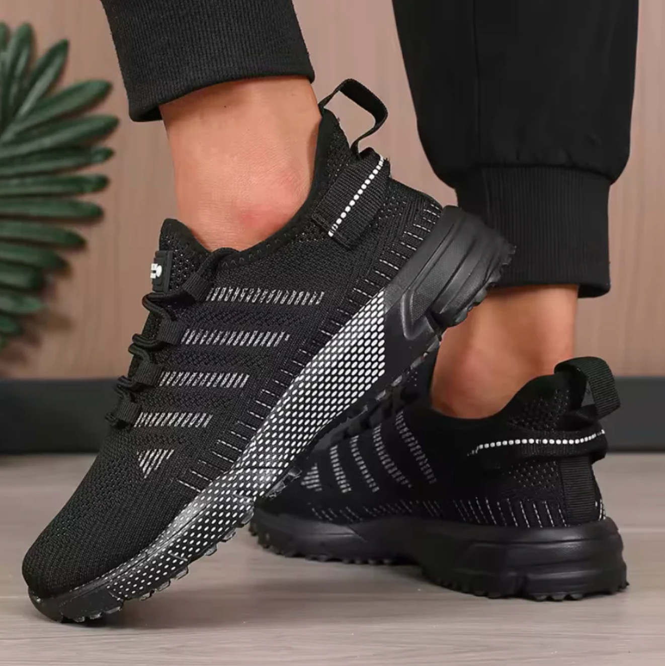 Knit lace-up sneakers with pull tabs, contrasting side trim and textured sport soles
