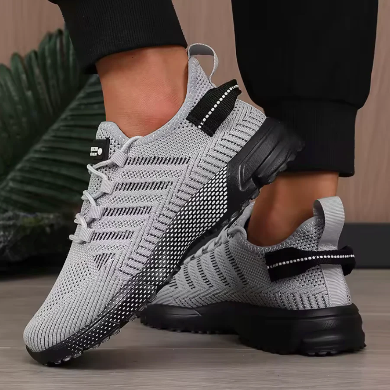 Knit lace-up sneakers with pull tabs, contrasting side trim and textured sport soles