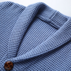 Knit cardigan with shawl collar buttons and patch pockets