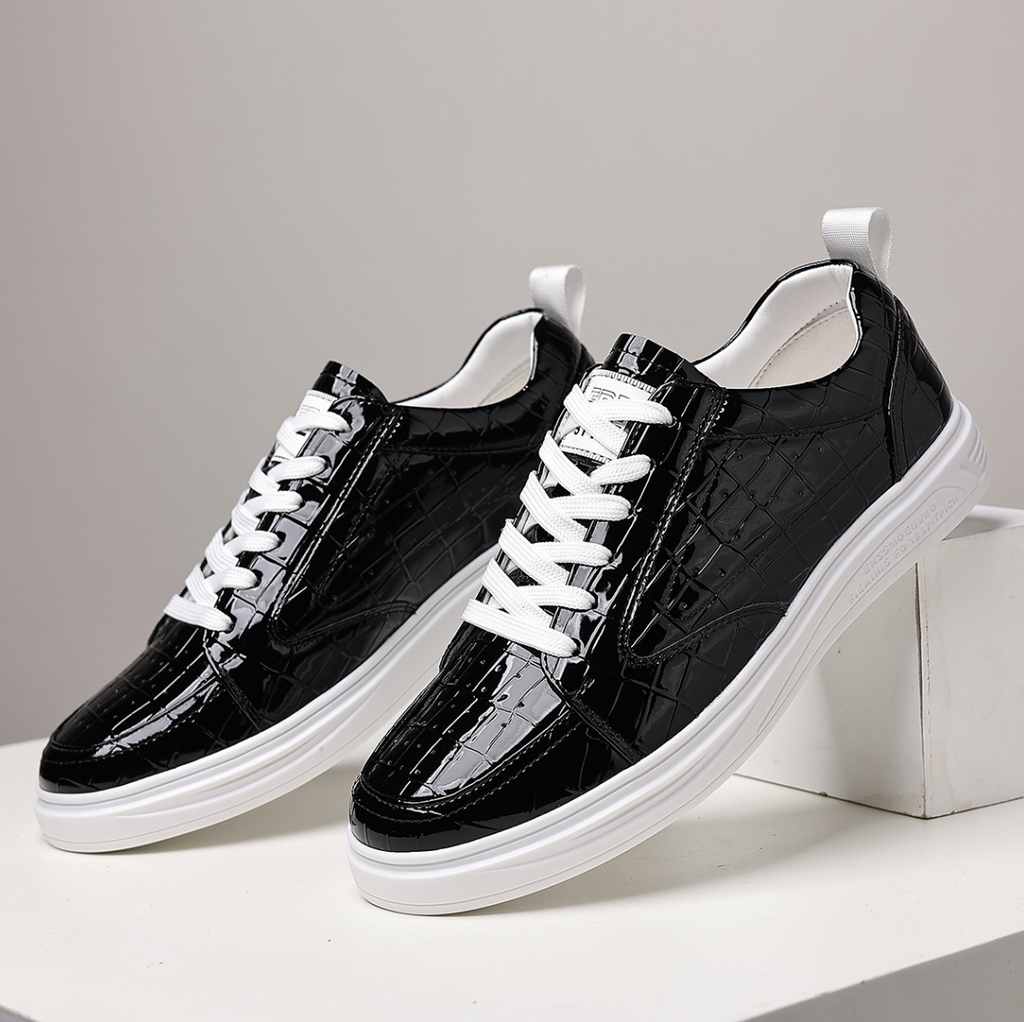 Glossy crocodile-effect trainers with white laces and platform soles