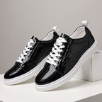 Glossy crocodile-effect trainers with white laces and platform soles