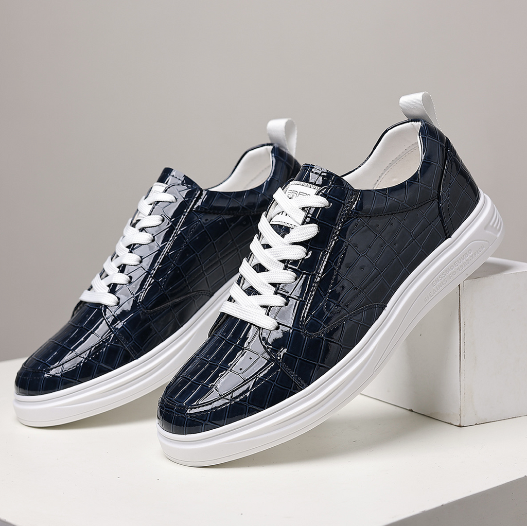 Glossy crocodile-effect trainers with white laces and platform soles