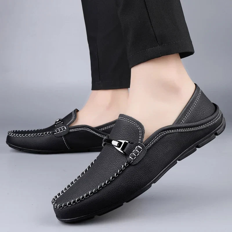 Men's slip-on loafers with moc toe stitching and metal bit detail