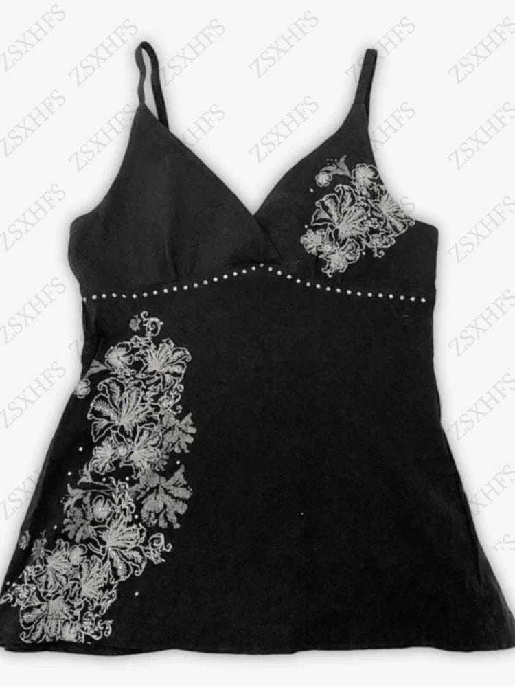 Black floral cami top with V-neckline and spaghetti straps