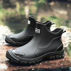 Women's Chelsea-style ankle rain boots with round toes and lugged soles