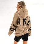 Women's graphic print hoodie with hood and bold back lettering
